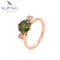 Roségoldener Statement-Ring mit grünem Zirkonia #15577A7